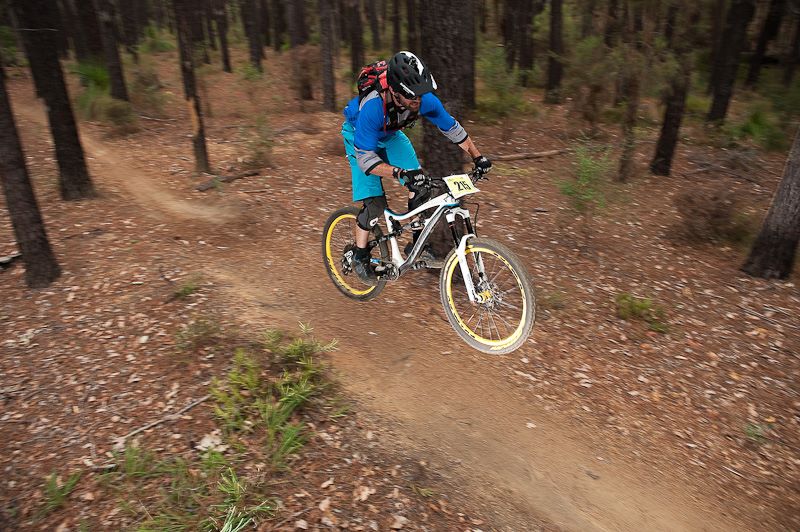 The man behind round 6 and Kalamunda Cycles team rider Devin Stafford on his way to 1st in the Male Masters. _pic:Matthew Farrell